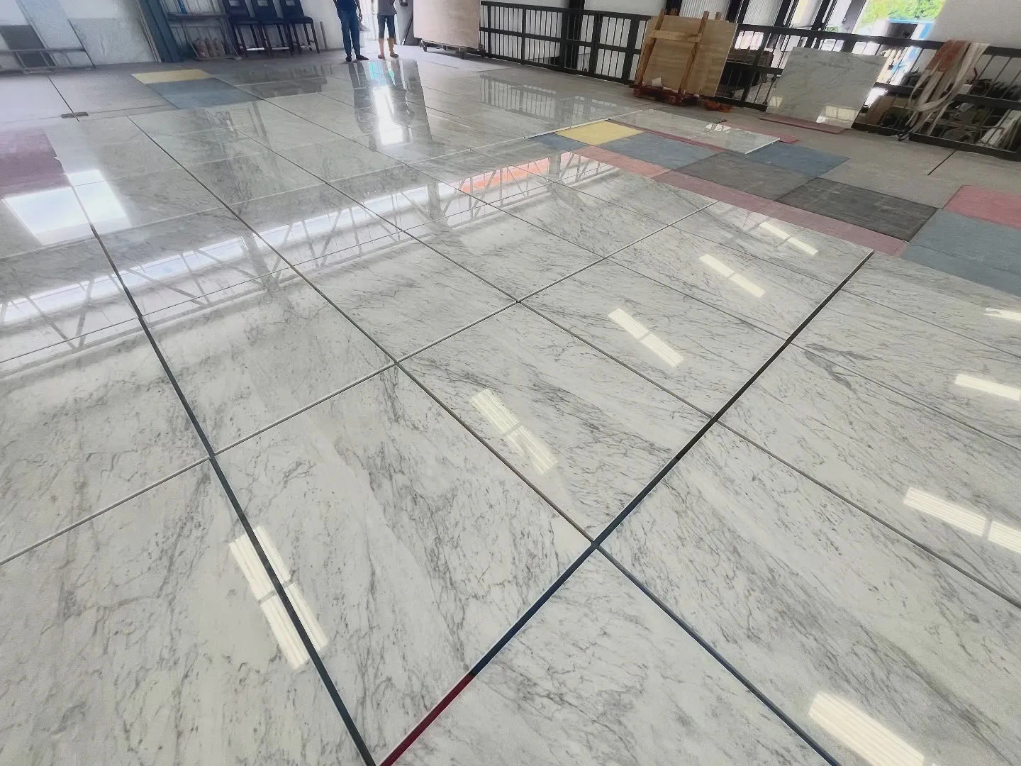 High-quality marble flooring samples often recommended by an experienced landed house contractor in Singapore